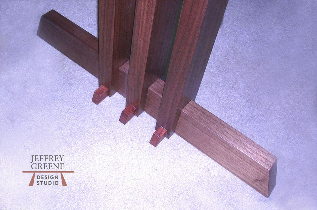 Detail of Joinery of Live Edge Book Matched Black Walnut Solid Wood Slab Dining Table with African Bubinga Butterfly Surface Inlays with Solid Walnut and African Bubinga Pegged Three Column Base by Jeffrey Greene